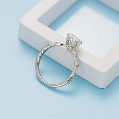 Round Moissanite Half-Eternity Petal Ring